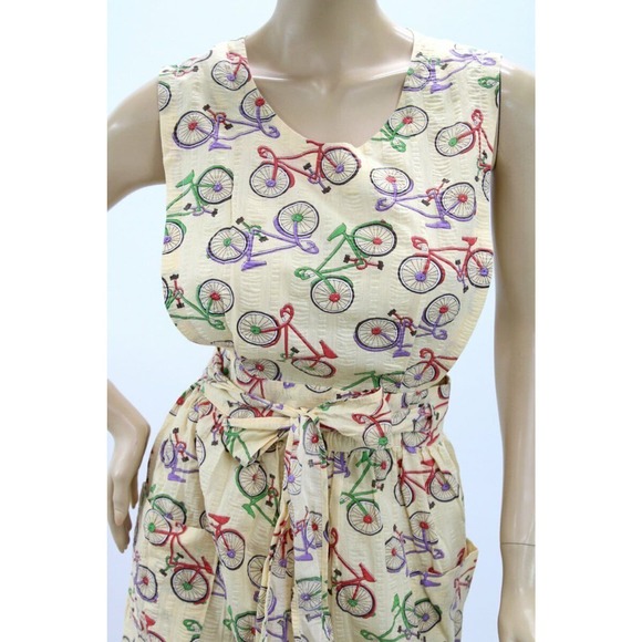 Long Bib Apron Bicycles on Yellow seersucker fabric Wrap style Pinafore M L - Picture 2 of 9